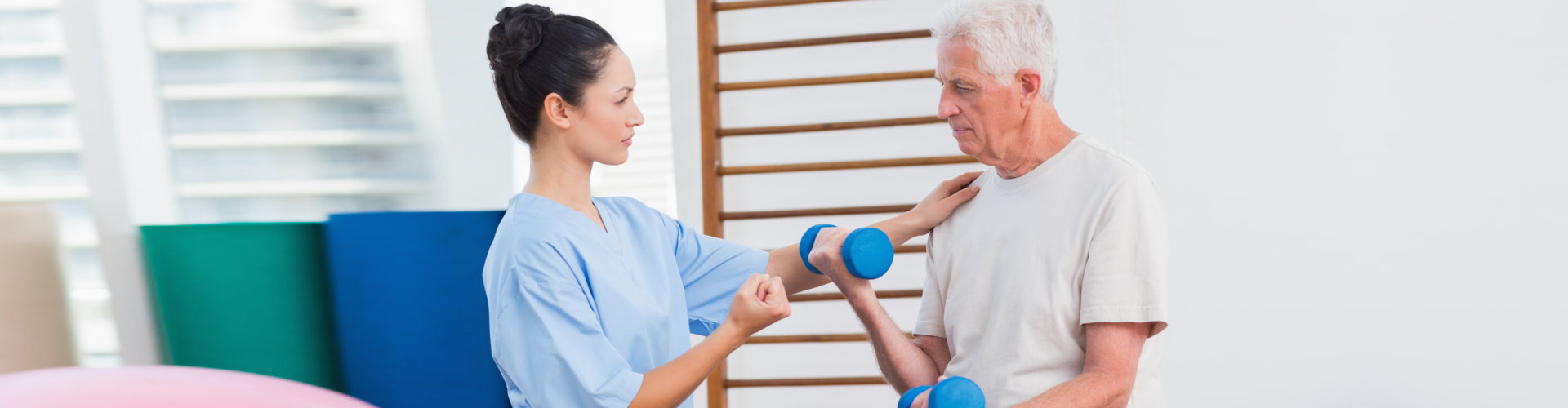 Therapist assisting a patient